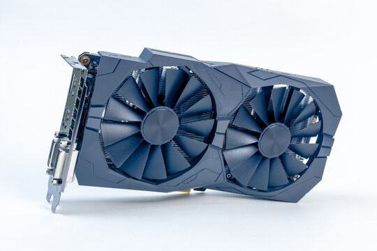 A budget dual fan graphics card stands upright on a white background. The angled view shows the cooler shroud, heatsink fins and the video ports on the bracket. Entry level GPU for a PC build