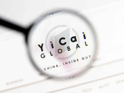 Milan, Italy 2026, 15 AGO Closeup of Yicai Global website page on a laptop screen. Focus on Yicai Global logo under a magnifying glass.