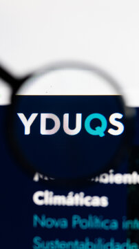 Milan, Italy 2026, 15 AGO Closeup of Yduqs website page on a laptop screen. Focus on Yduqs logo under a magnifying glass.