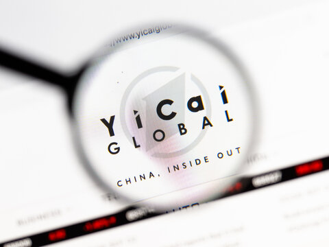 Milan, Italy 2026, 15 AGO Closeup of Yicai Global website page on a laptop screen. Focus on Yicai Global logo under a magnifying glass.