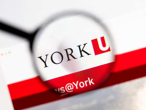 Milan, Italy 2026, 15 AGO Closeup of York University Canada website page on a laptop screen. Focus on York University Canada logo under a magnifying glass.