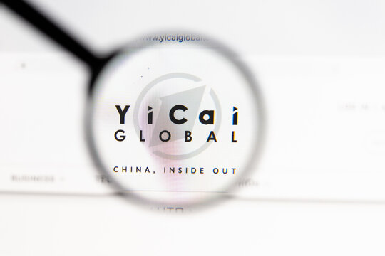 Milan, Italy 2026, 15 AGO Closeup of Yicai Global website page on a laptop screen. Focus on Yicai Global logo under a magnifying glass.