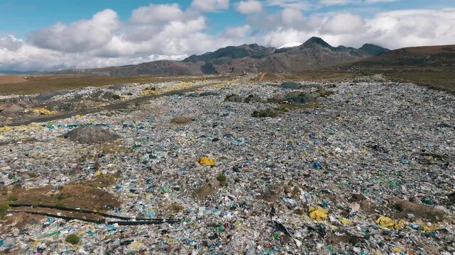 Massive Open Landfill Covering Mountain Landscape