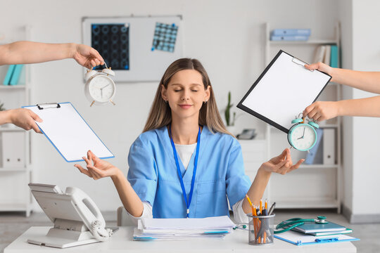 Burnout and healthcare stress, nurse practicing mindfulness and meditation to manage heavy workload and time pressure in a busy hospital office environment