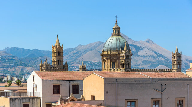 Dome and towers of Palermo Cathedral against Monte Cuccio