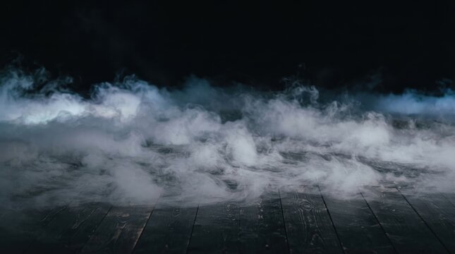 Dense white smoke or fog rolling over dark wooden floorboards