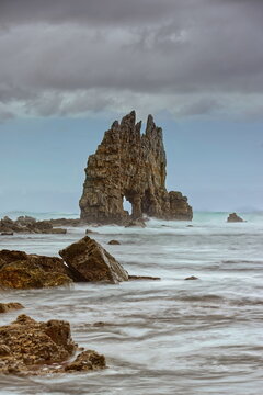 Playa de Portizuelo Beach and Piedra El &Oacute;leo Rock, pounded by the waves of the rising tide on a springtime sundown. Barcia, Vald&eacute;s-Asturias-Spain-039