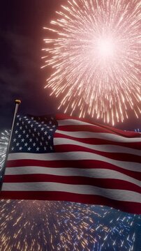 United States flag waving at night during a spectacular fireworks display