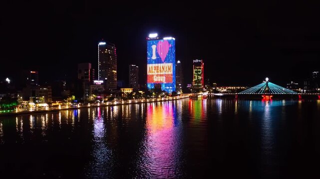 Da Nang at Night Along the Han River &ndash; Illuminated Tran Thi Ly Bridge, High-Rise Skyline and Colorful Reflections on the Waterfront