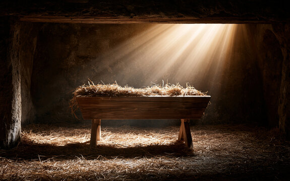 This empty wooden manger with straw sits inside a rustic stone stable illuminated by divine, warm golden light rays, evoking hope and peace for Christmas. There are no people.