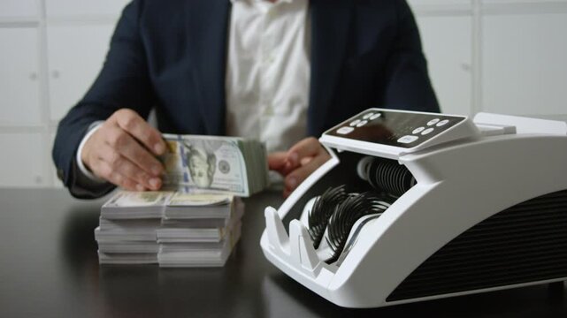 Businessman with money in office. Business man counting money and managing cash. Business concept with cash and digital work. Banker in office. Businessman accountant in office.