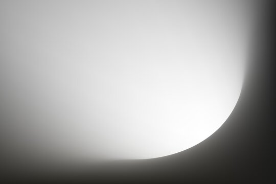gradient light abstract background featuring a soft curved white glow