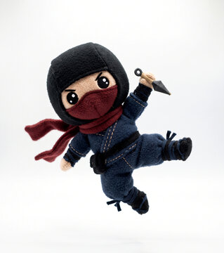 Felt Ninja Plush Toy in Jumping Action Pose with kunai - Isolated on White