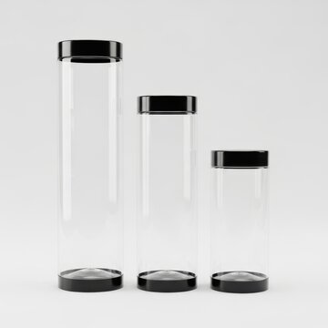 Three clear cylindrical containers with black lids in different sizes