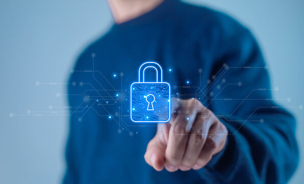 Cybersecurity concept showing a professional securing digital data with a glowing padlock interface, representing online privacy, information security, data protection, network security, encryption.