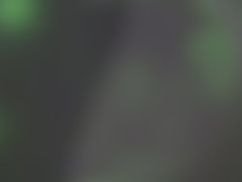 Una toma de cerca de un fondo abstracto de luces de navidad de color verde y blanco en la oscuridad. Desenfoque bokeh