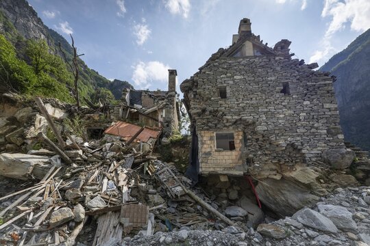 Devastation of a house due to debris and boulders, as a result of heavy rock and debris flow on the night of June 29-30, 2024 following heavy rains, Fontana, Bavona Valley or Val Bavona, Maggia Valley, Tessin, Switzerland