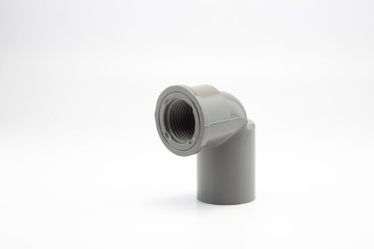 Close-up photo of plastic paralon pipe connections on a white background