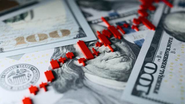 US Treasury Bond Market Chart Over Dollar Banknotes