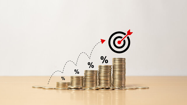 Investment growth and financial target achievement concept with stacked coins, percentage increase, and upward arrow leading to goal, representing profit return, wealth accumulation, financial success