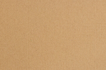 Brown cardboard sheet abstract background, texture of sepia color kraft paper with vintage pattern...