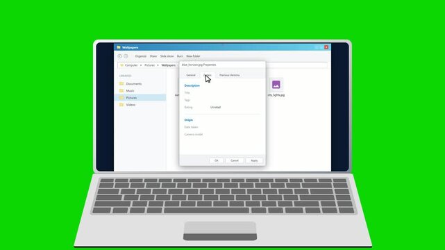 Laptop computer opening file properties on green screen. 4K Video