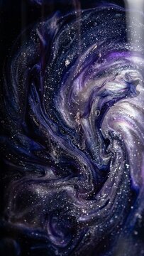 Purple fluid acrylic abstract swirls with silver glitter particles creating cosmic nebula texture background