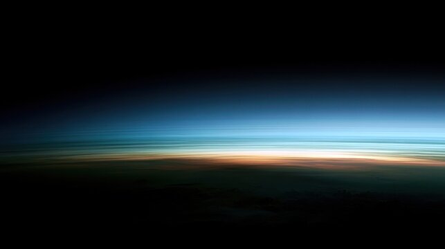 The Atmosphere surrounds Earth with protective gases that regulate heat, enable weather systems, and continuously circulate air and water vapor across the planet.
