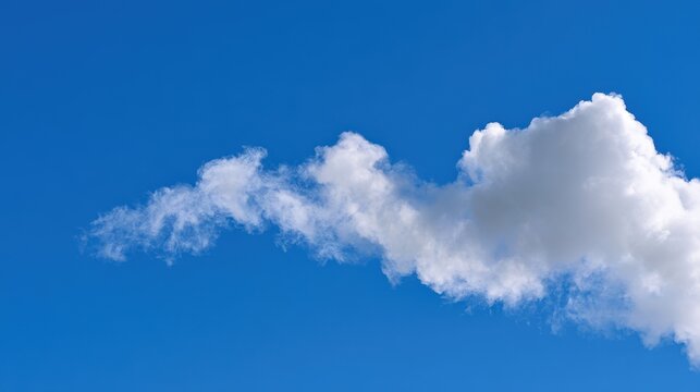 Cooling air drives Atmospheric Cloud Formation by turning invisible water vapor into tiny droplets or ice crystals that accumulate and become visible in the sky.
