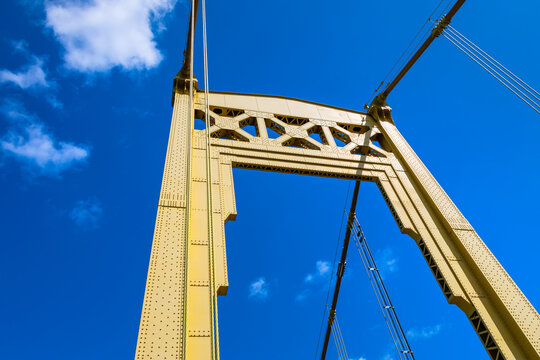 Roberto Clemente Bridge yellow steel structure against blue sky