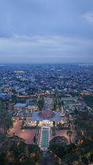 Fototapeta premium Aerial view of Sabilal Muhtadin Mosque at twilight in the urban center of Banjarmasin, Indonesia