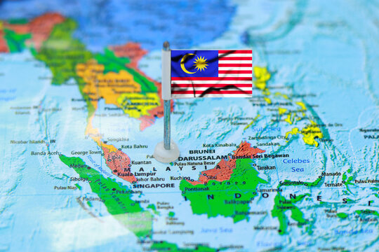Flag of Malaysia Pinned on World Map Concept for Travel Destination, Geography, or International Business