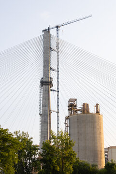 Cable stayed bridge tower construction with concrete silo