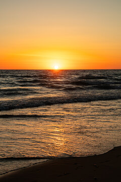 sunset on La Barrosa beach in Sancti Petri, Cadiz, Spain
