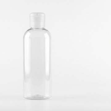 Minimalist Clear Plastic Flip Cap Bottle Mockup On White Background