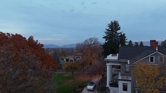 Yakima Washington Autumn Neighborhood and Colorful Trees Aerial Pan
