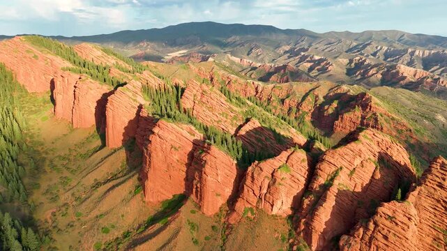 An aerial view of the Jeti-&Ouml;g&uuml;z rocks in the Jeti-&Ouml;g&uuml;z district of the Issyk-Kul region in Kyrgyzstan. Also known as the Seven Bulls. Beautiful rock formations bathed in the light of the rising sun.