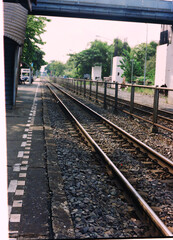 Fototapeta premium railway in the countryside. Film photo.