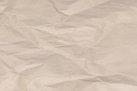 Subtly wrinkled greige paper texture background for luxury branding and business card mockup