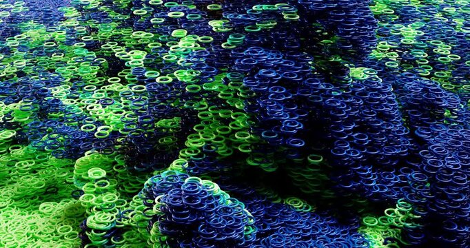 Colorful circular particles travel across a dark abstract environment in a continuous horizontal stream of digital motion.