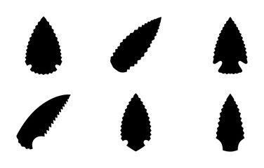 Obraz premium Set of Six Black Arrowhead Silhouettes, Ancient Stone Tools, Primitive Weaponry Icons, Historical Artifacts Collection