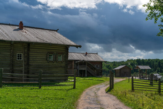An installation of a traditional Russian northern village in the Mezen sector of the Malye Korely Museum‑Reserve on a summer sunny day, Malye Karely village, Arkhangelsk Oblast, Russia