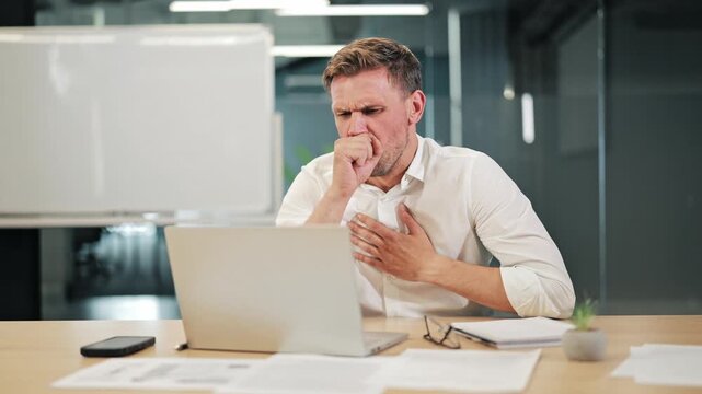 Employee experiences persistent cough, chest discomfort. Productivity interrupted. Health awareness and workplace well-being crucial for worker experiencing symptoms.