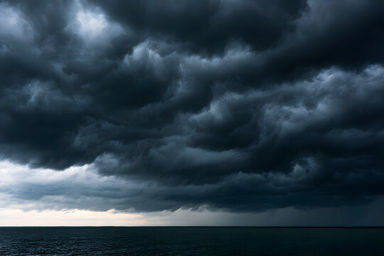 Storm clouds covering the flat horizon, dark and ominous, with heavy rain clouds forming a dramatic sky scene. A powerful and natural weather phenomenon concept, illustrating the forces of nature, cli