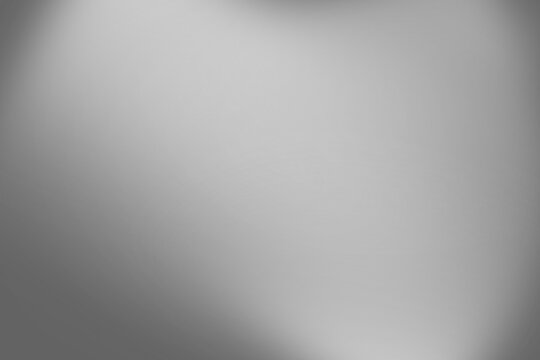 Abstract gray background with a blurred mosaic or pixelated texture effect