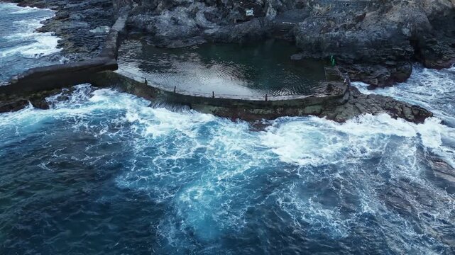 Natural pool at Acantilado de los Gigantes, Tenerife, Atlantic Ocean &ndash; panoramic aerial view.