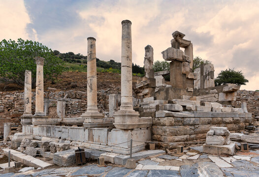 Ancient Roman ruins of the Memmius Monument in Ephesus, Turkey, featuring a cubistic architectural arrangement of fragmented stone columns and historical masonry