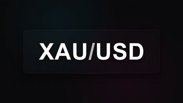 A bright white XAU USD currency pair ticker sign glows against a dark matte black surface representing current gold trading rates for financial market participants engaged in global commodity