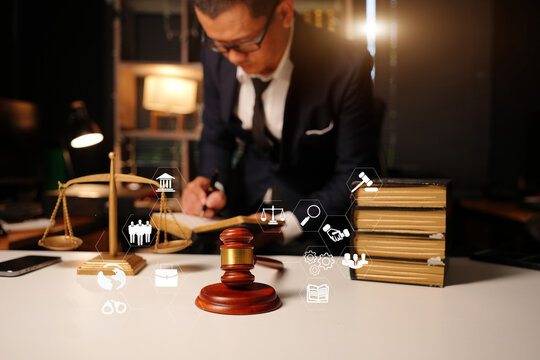 Lawyer working late in office documents with legal icon 