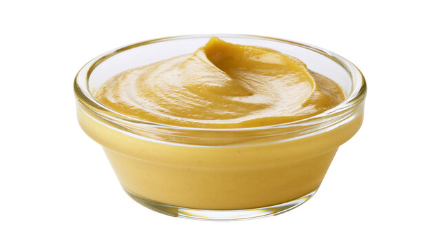 Yellow mustard sauce swirled in a clear glass bowl, isolated on transparent background